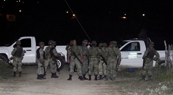 Soldiers guard the crime scene where Prisciliano Rodriguez, mayor of the Doctor Gonzalez municipality, was shot dead by gunmen Thursday at his ranch 30 miles east of Monterrey, in northern Mexico. Rodriguez is the fourth mayor in northern Mexico to be murdered in little more than a month. 